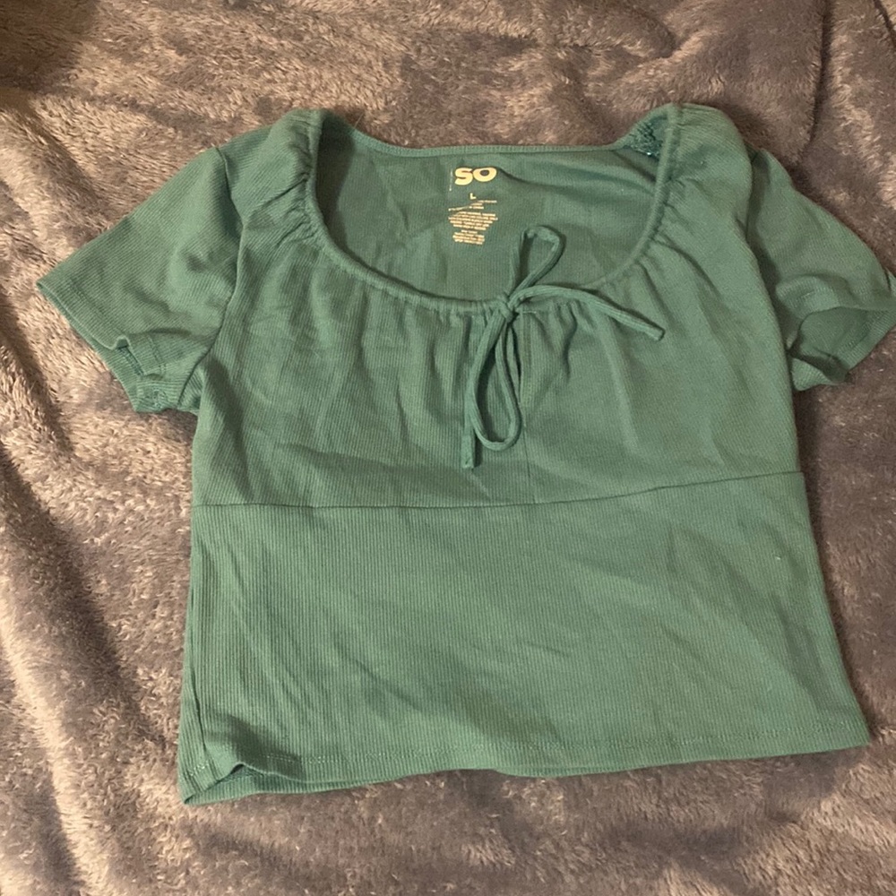 teal SO tee shirt with a tie in the front